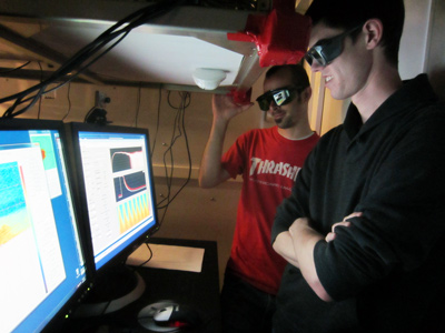 Denton Scott (left) and Alex Wallace (right) observing data collection.